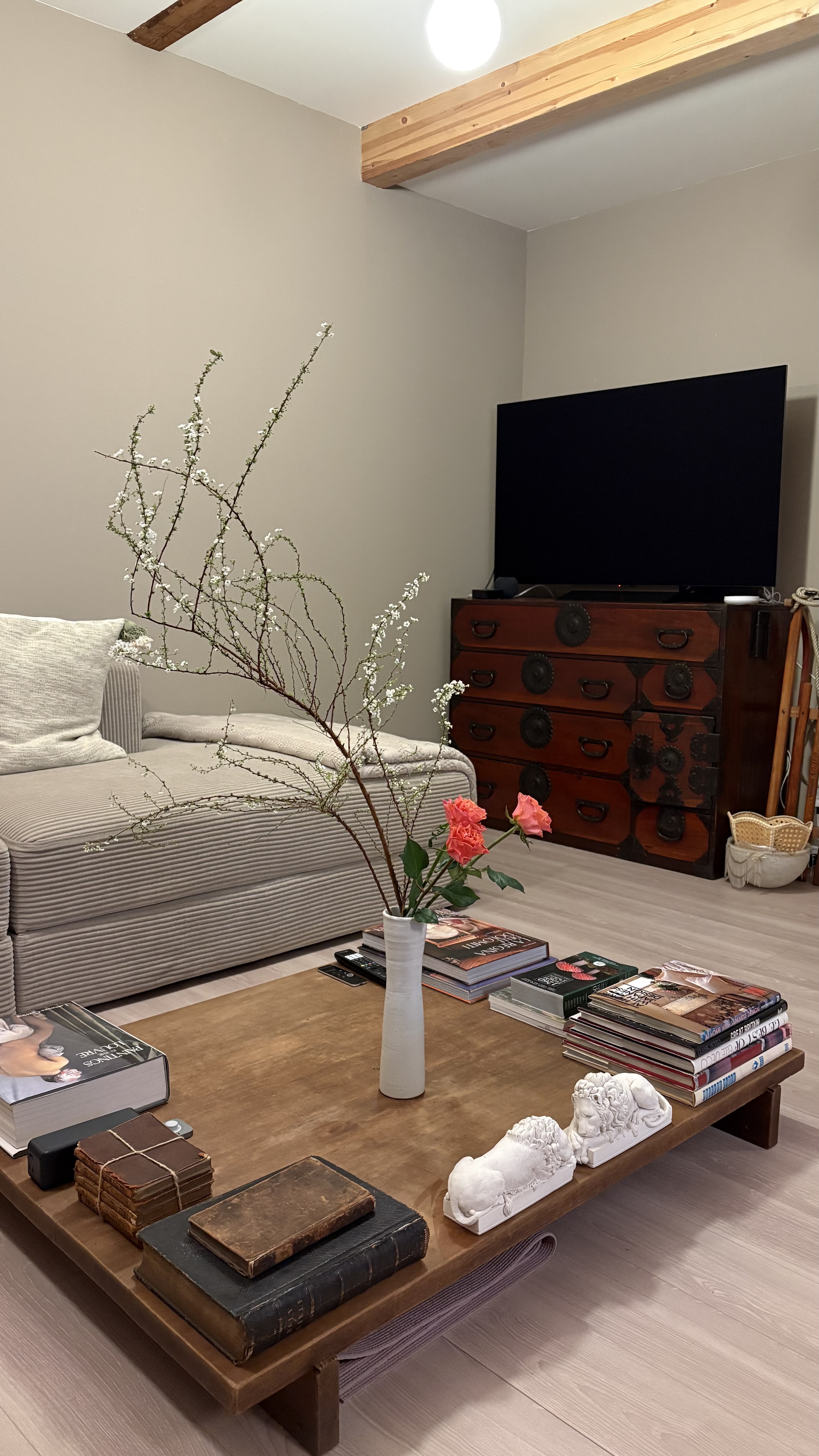 Vintage Japanese coffee table with flower arrangement inside restored akiya