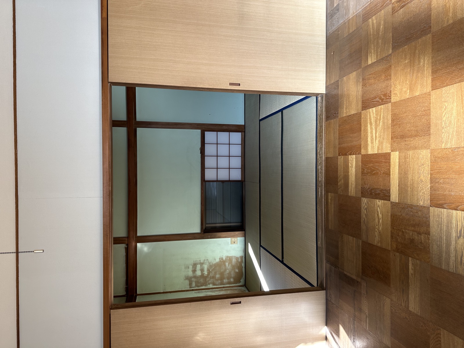 Original living area with sliding doors before akiya restoration