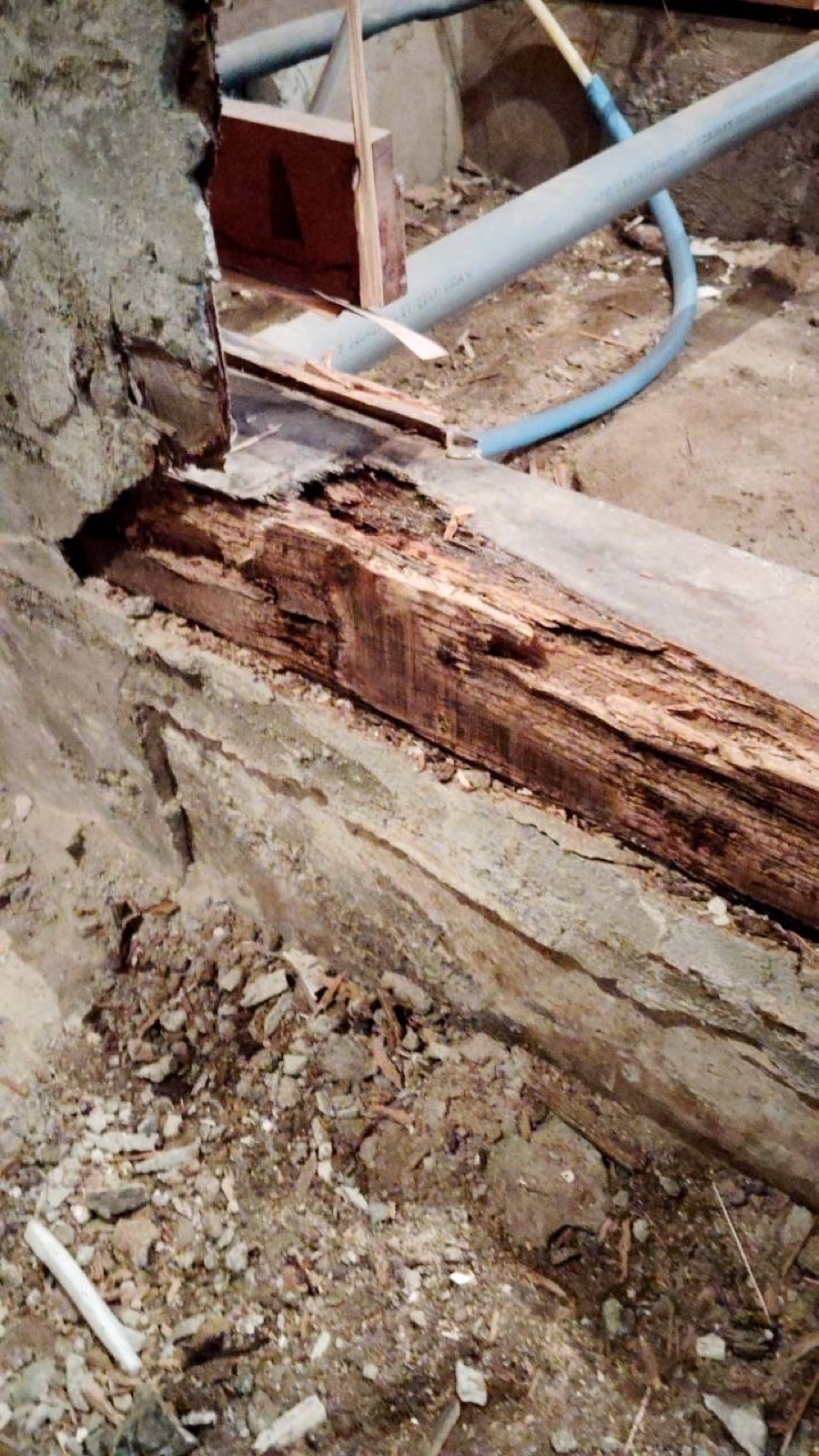 Rotted wooden foundation exposed during akiya restoration