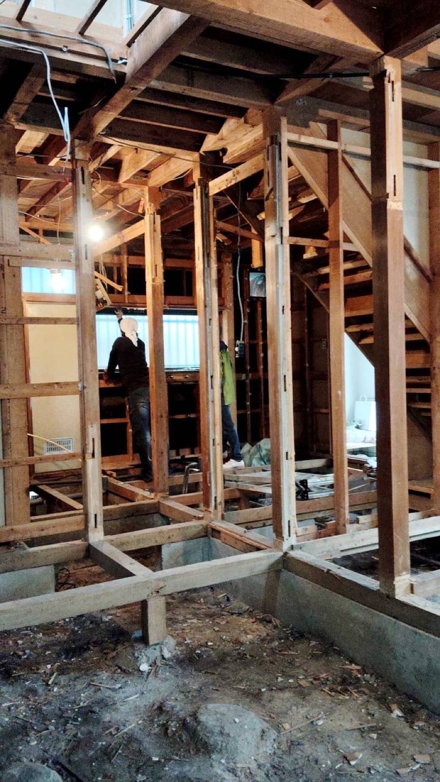 Stripped wooden frame of akiya during structural restoration